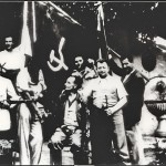 “Romanengo: il gruppo partigiano nei giorni della Liberazione. Al centro col fucile il “noto antifascista Attilio Maffezzoni”